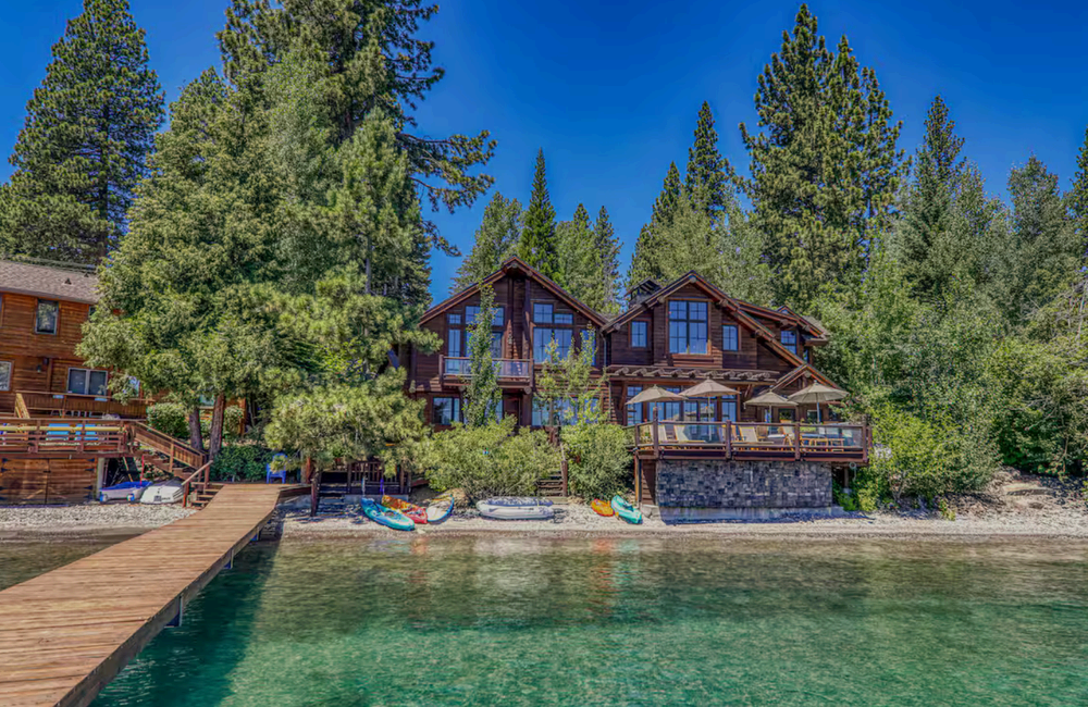 Lakefront Creator Camp content house surrounded by pines