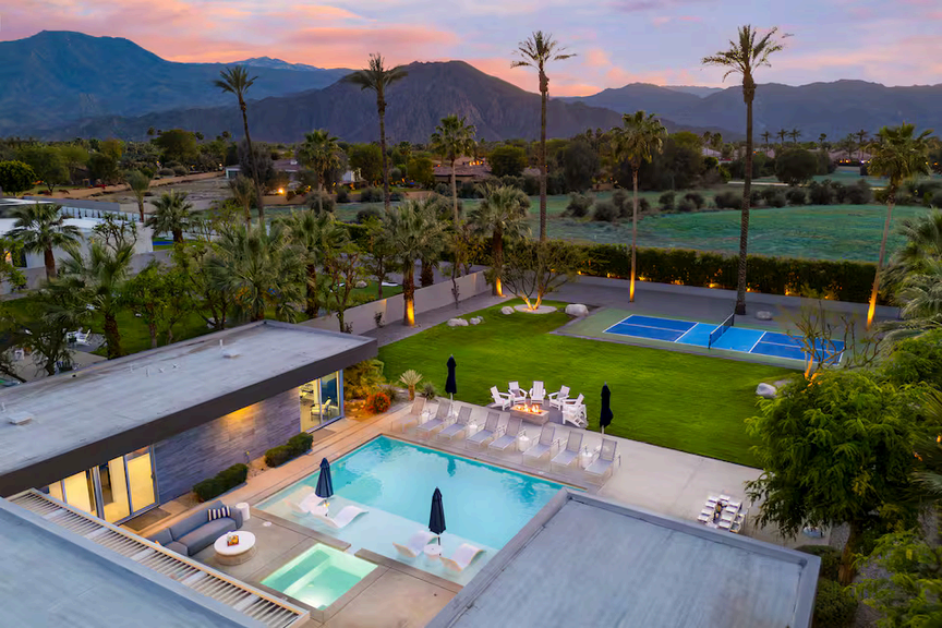 Aerial view of a Creator Camp content house with pool and tennis court