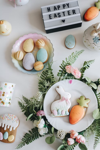 Plate of Easter eggs beside a Happy Easter sign