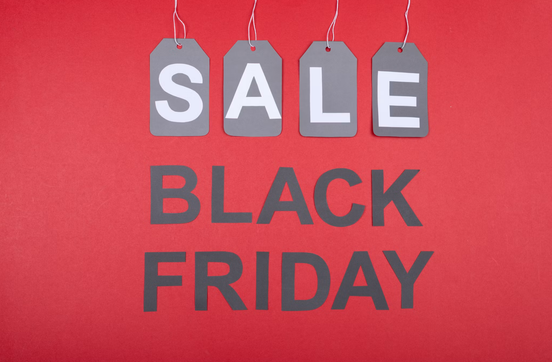 Black Friday sale tags on a red background